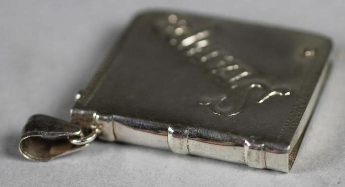 TWO STERLING SILVER STAMP HOLDERS Image