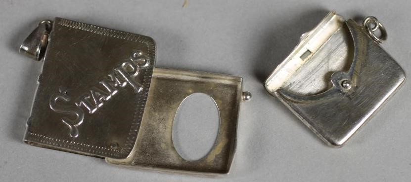 TWO STERLING SILVER STAMP HOLDERS Image