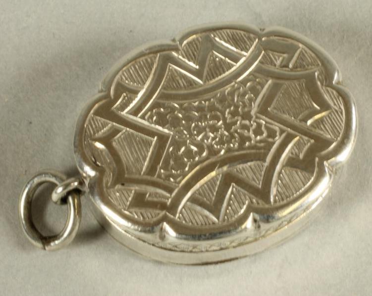 A VICTORIAN SILVER PENDANT VINAIGRETTE Image