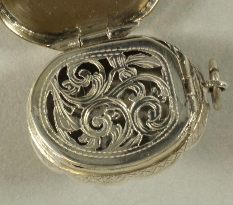 A VICTORIAN SILVER PENDANT VINAIGRETTE Image