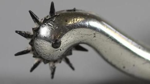 A GEORGE III SILVER SPUR Image