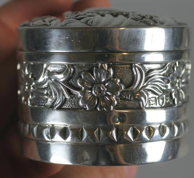 A LATE VICTORIAN SILVER BOX AND COVER Image