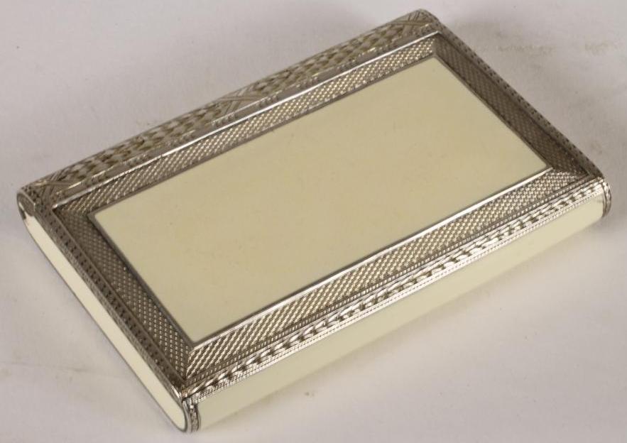 AN ART DECO SILVER AND ENAMEL CIGARETTE CASE Image