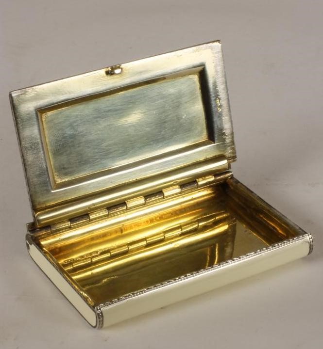 AN ART DECO SILVER AND ENAMEL CIGARETTE CASE Image