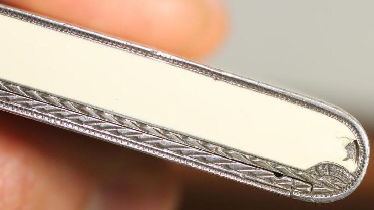 AN ART DECO SILVER AND ENAMEL CIGARETTE CASE Image