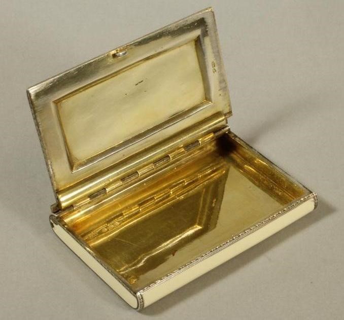 AN ART DECO SILVER AND ENAMEL CIGARETTE CASE Image