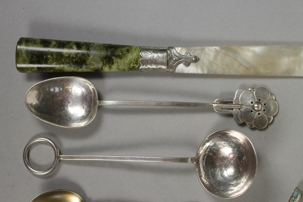 TWO ARTS AND CRAFTS SILVER PRESERVE SPOONS Image