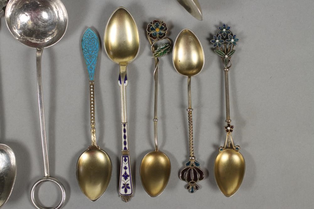 TWO ARTS AND CRAFTS SILVER PRESERVE SPOONS Image
