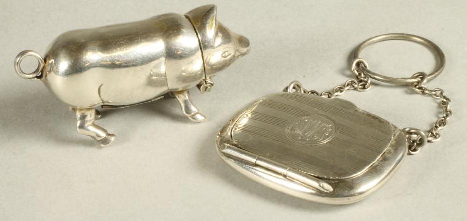 A SILVER MINIATURE COMPACT Image