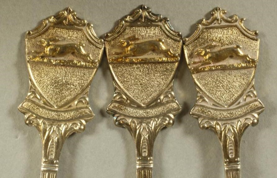 A COMPOSITE SET OF THREE SILVER TROPHY TEASPOONS Image