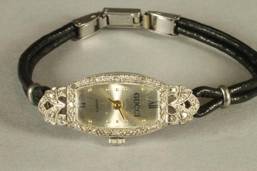 A GUCCI DIAMOND SET COCKTAIL WATCH Image