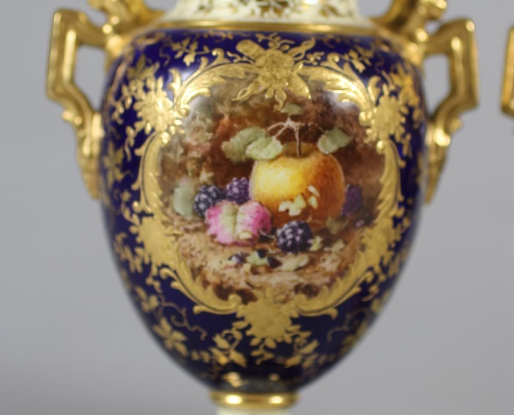A PAIR OF COALPORT CHINA VASES AND COVERS Image