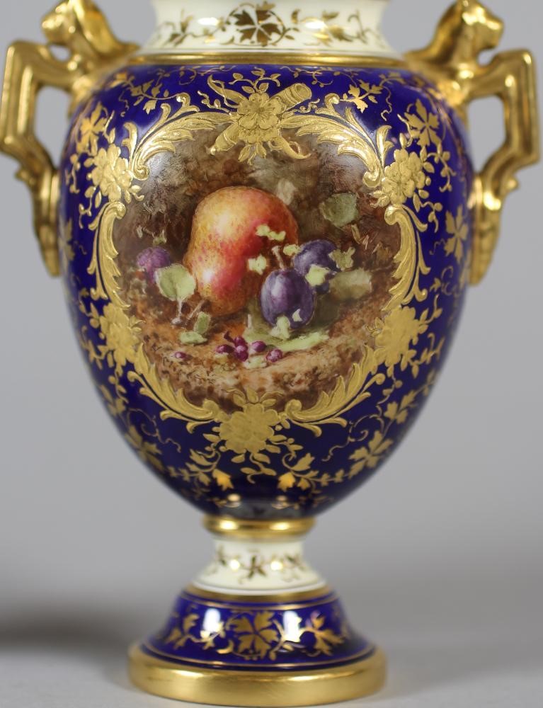 A PAIR OF COALPORT CHINA VASES AND COVERS Image