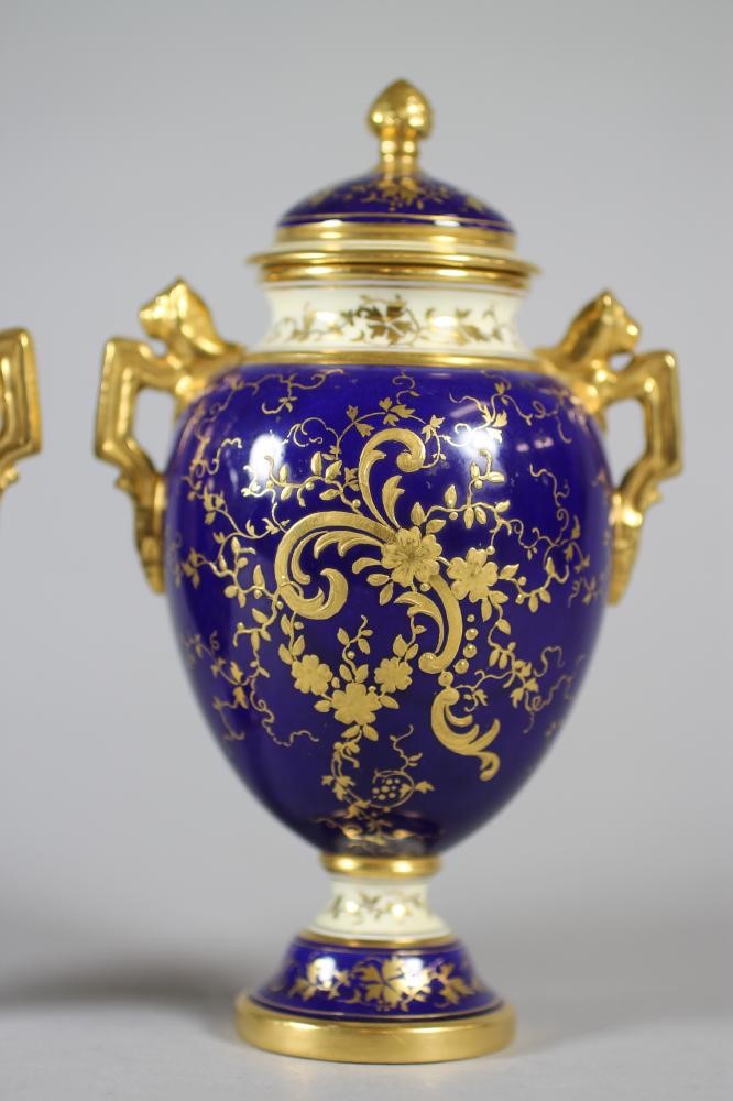 A PAIR OF COALPORT CHINA VASES AND COVERS Image
