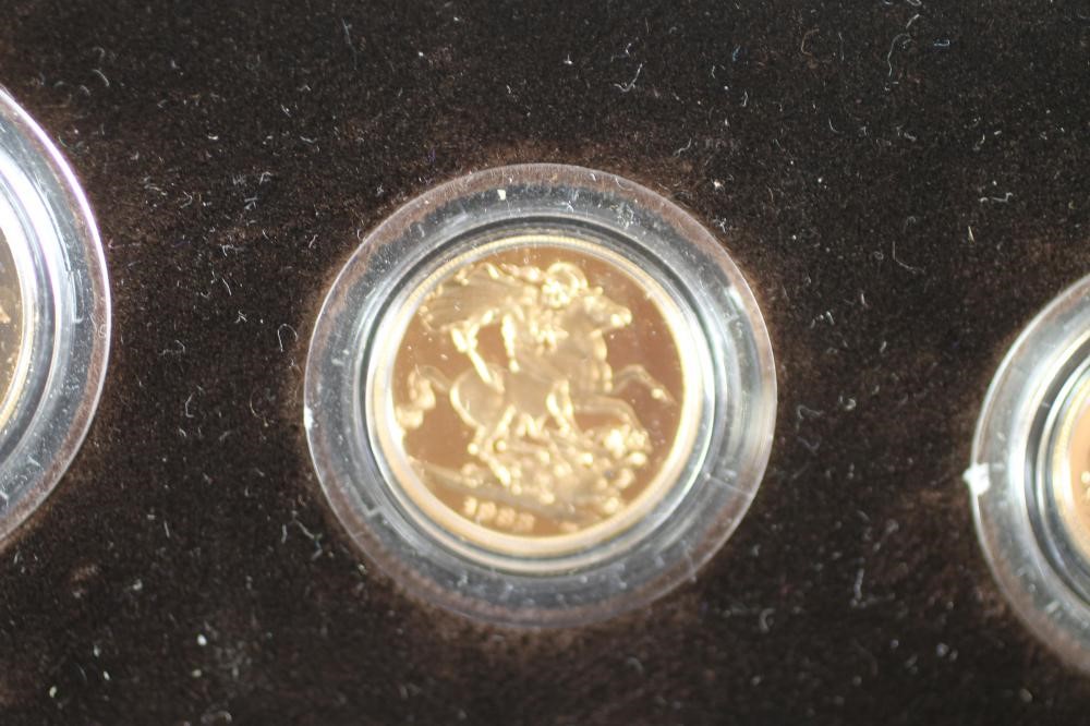 AN ELIZABETH II GOLD THREE COIN PROOF SET Image