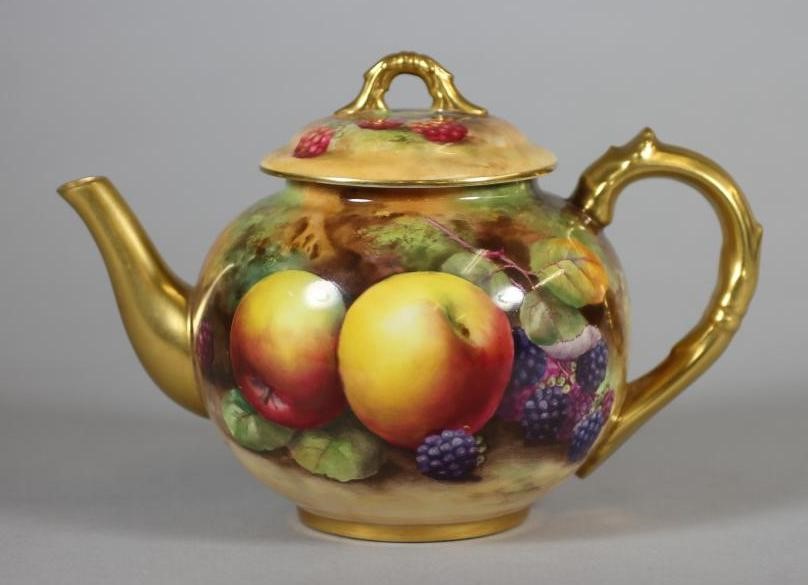 A ROYAL WORCESTER CHINA TEAPOT AND COVER Image