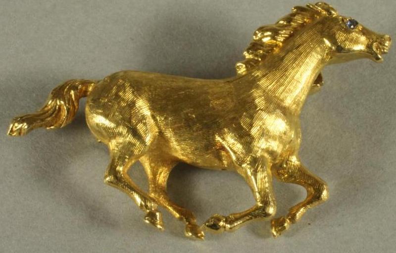 AN 18CT GOLD BROOCH Image