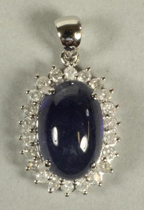 A SAPPHIRE AND DIAMOND PENDANT Image
