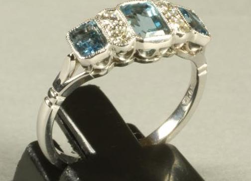 AN ART DECO STYLE AQUAMARINE AND DIAMOND RING Image