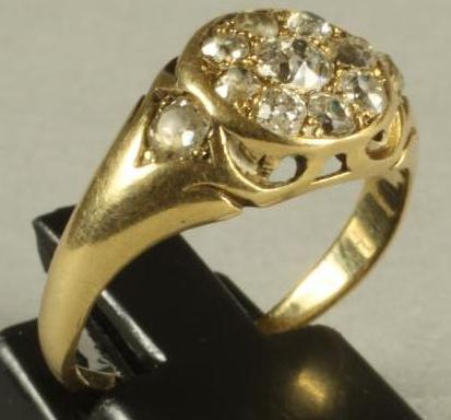 A VICTORIAN DIAMOND CLUSTER RING Image