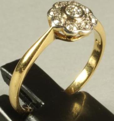 A DIAMOND CLUSTER RING Image