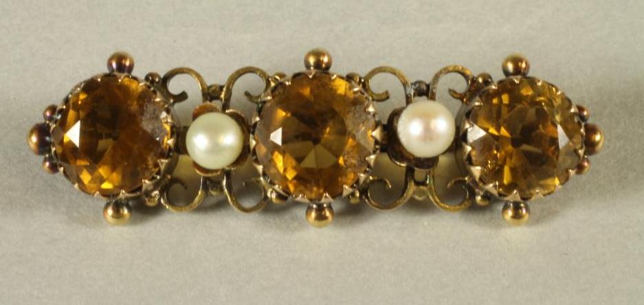 A VICTORIAN CITRINE AND PEARL BAR BROOCH Image
