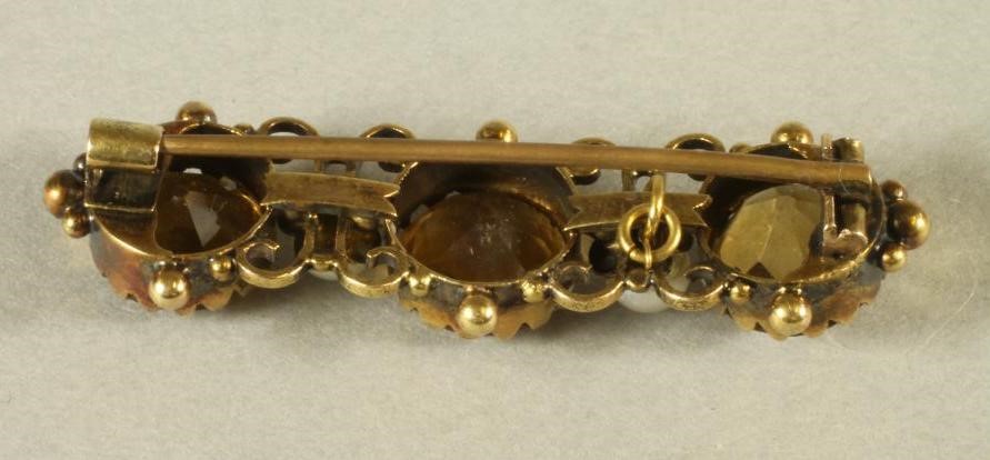 A VICTORIAN CITRINE AND PEARL BAR BROOCH Image