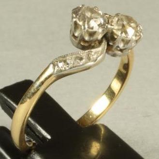 A VICTORIAN TWO STONE DIAMOND RING Image
