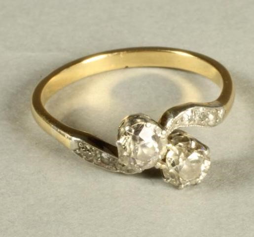 A VICTORIAN TWO STONE DIAMOND RING Image