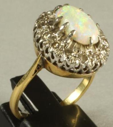 AN OPAL AND DIAMOND CLUSTER RING Image