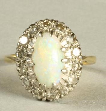 AN OPAL AND DIAMOND CLUSTER RING Image
