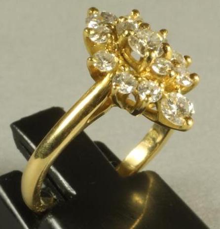 A DIAMOND CLUSTER RING Image