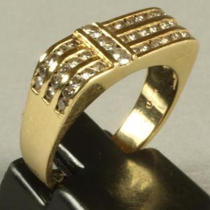 A DIAMOND HALF HOOP COCKTAIL RING Image