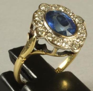 A SAPPHIRE AND DIAMOND CLUSTER RING Image