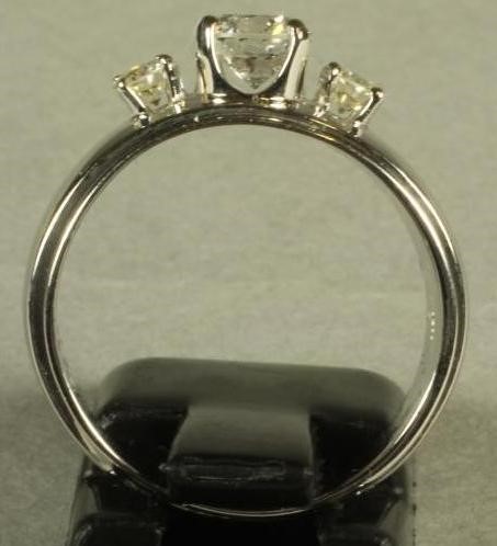 A THREE STONE DIAMOND RING Image