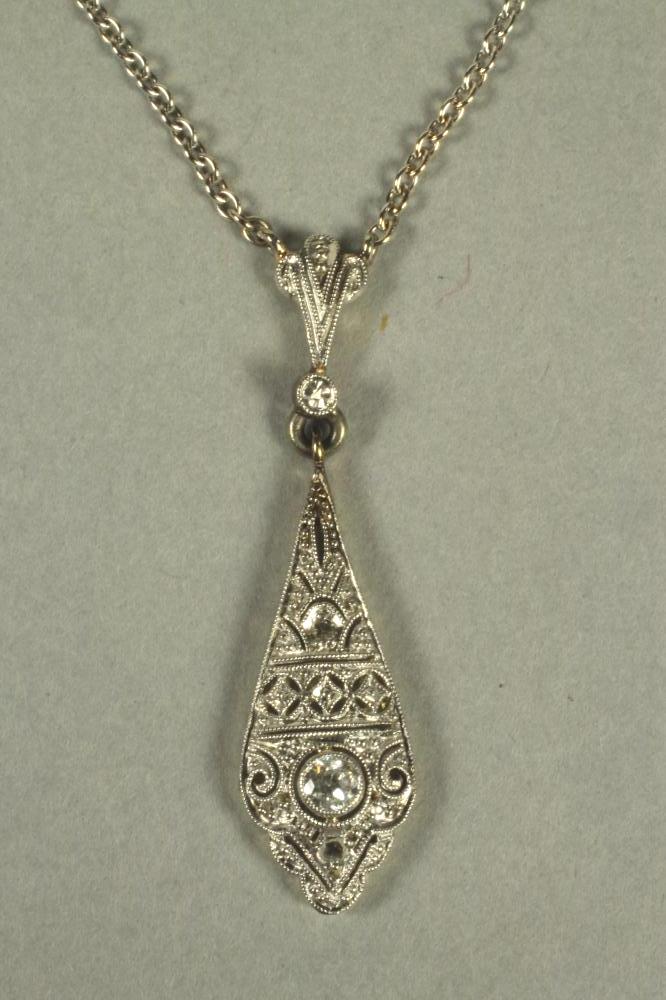 AN ART DECO STYLE DIAMOND SET PENDANT Image