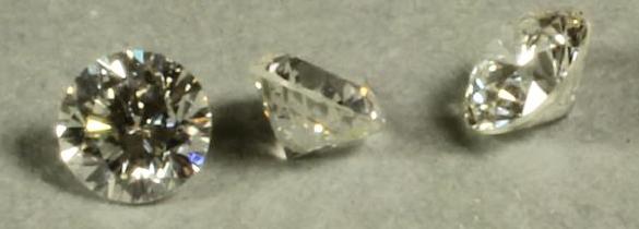 THREE BRILLIANT CUT UNMOUNTED DIAMONDS of 0.17cts (x 2) and 0.19cts Image