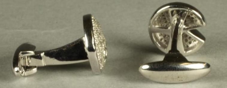 A PAIR OF DIAMOND CUFFLINKS Image