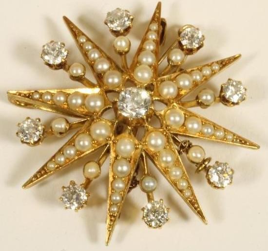 A DIAMOND AND PEARL STAR BROOCH/PENDANT Image