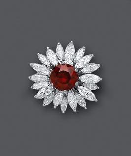 A GARNET AND DIAMOND COCKTAIL RING Image