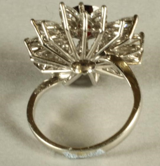 A GARNET AND DIAMOND COCKTAIL RING Image