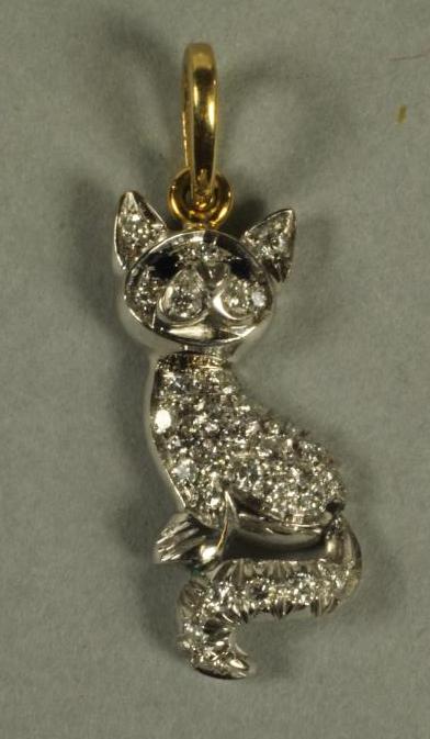 A DIAMOND SET NOVELTY PENDANT Image