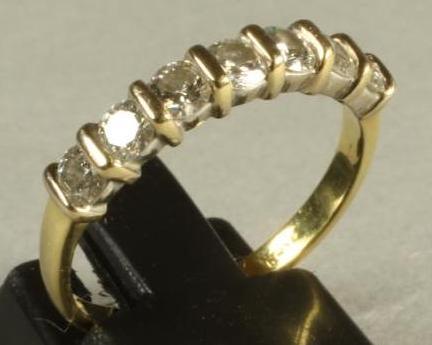A SEVEN STONE DIAMOND HALF HOOP ETERNITY RING Image