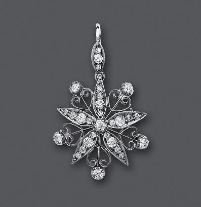 A LATE VICTORIAN DIAMOND SNOWFLAKE PENDANT/BROOCH Image