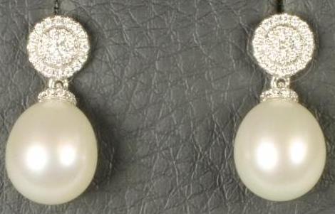 A PAIR OF PEARL DROP EAR STUDS Image
