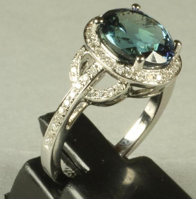 A TANZANITE AND DIAMOND DRESS RING Image