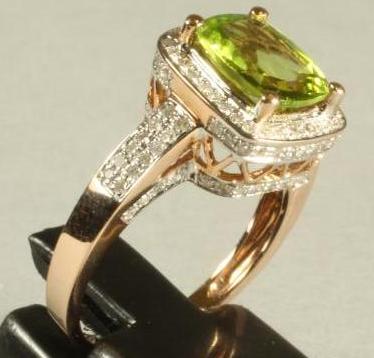A PERIDOT AND DIAMOND DRESS RING Image