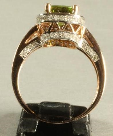 A PERIDOT AND DIAMOND DRESS RING Image