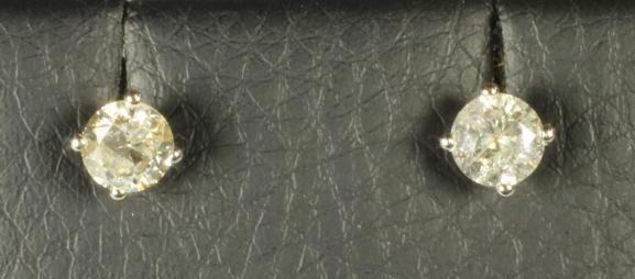 A PAIR OF DIAMOND EAR STUDS Image