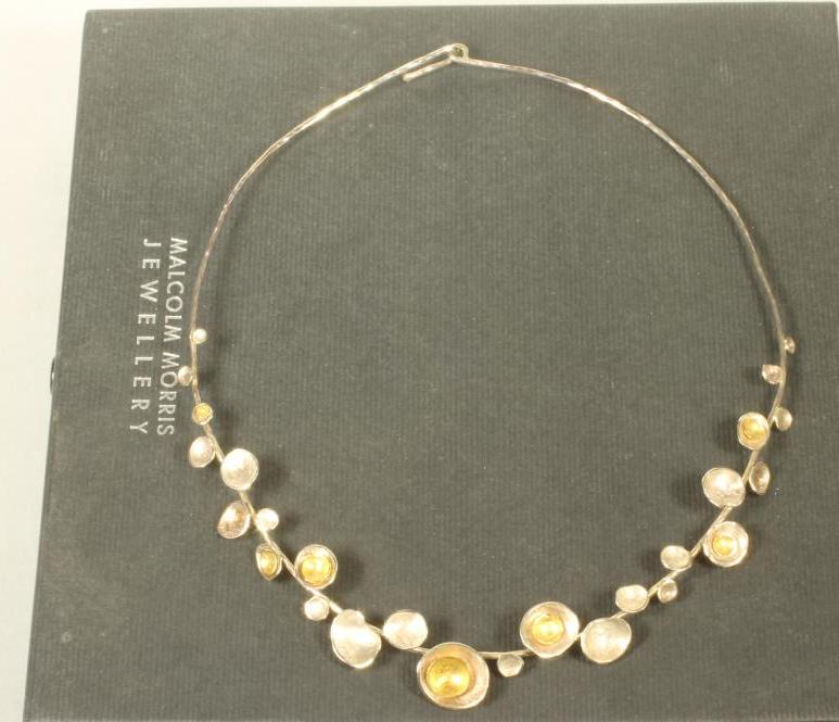 A MODERN SILVER CHOKER Image